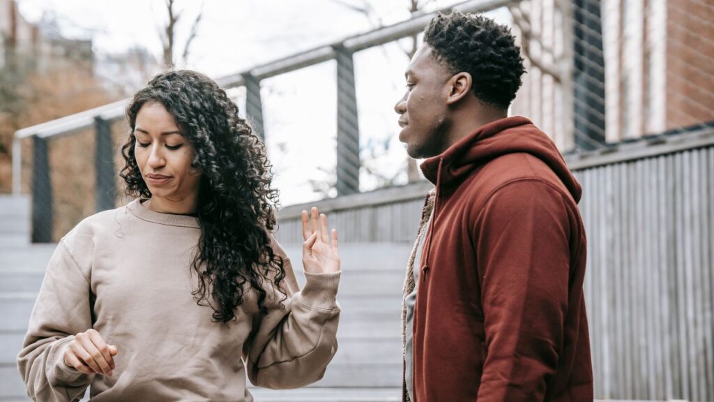 Girl rejecting mans advances in a date